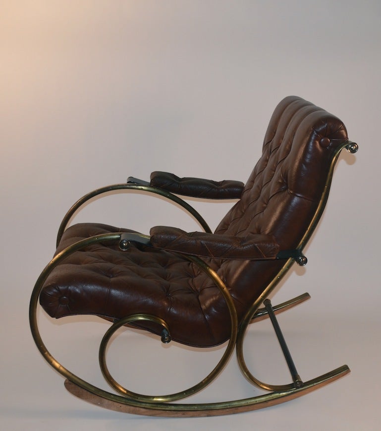 Woodard rocking chair, original tufted leather shows some wear, scratching etc. no rips or tears.