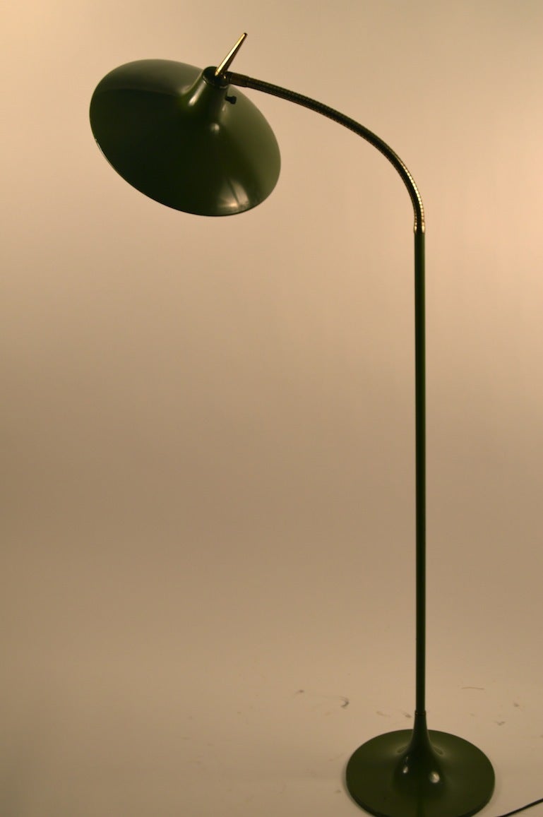 Hard to find this model ( B- 683 ) this example still retains the original plastic diffuser, often missing, or damaged. Original green paint finish, working clean condition. Brass gooseneck allows for adjusting the position of the light. Design in