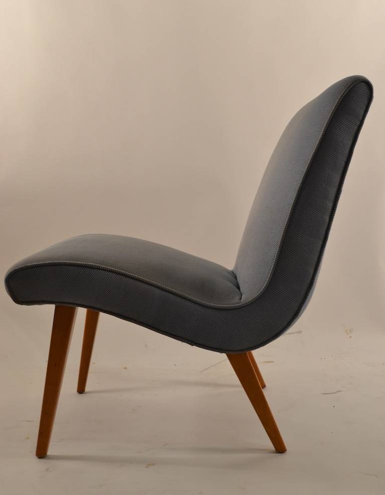 Elegant low profile scoop armless lounge chair, by Russel Wright 