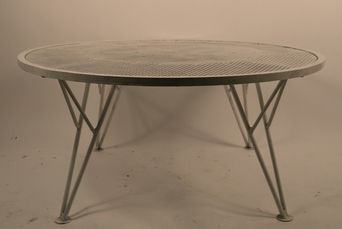 Tempestini for Salterini occasional table with wrought iron base and mesh top.
Clean ready to use, suitable for indoor or outdoor use.