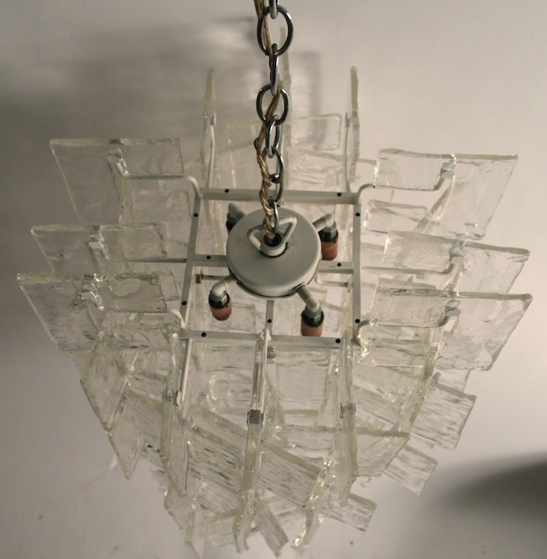 Stylish chic chandelier by Mazzega. This example has 
