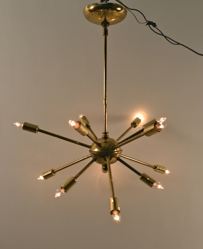 Very  nice 12-light brass Sputnik fixture,in original, working condition. Can be used with standard bulbs, or 