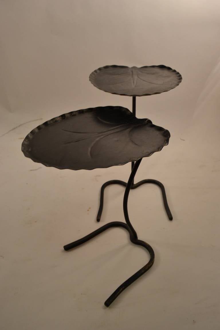 Nesting iron Lily Pad Leaf tables, in black paint finish. The shorter ( 18
