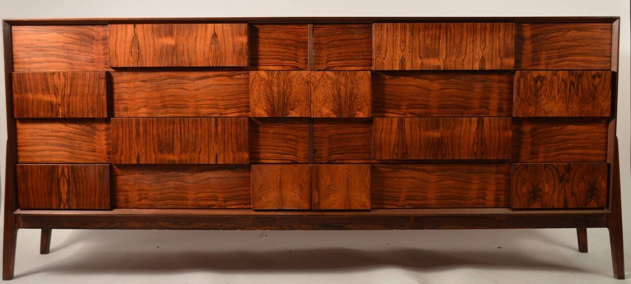 Made in Denmark designed by Piet Hein, vibrant Rosewood veneer, finished back, 