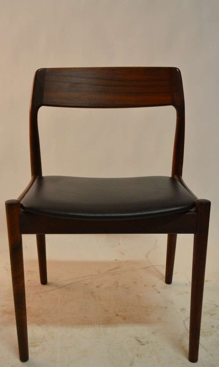 Great style, design, and construction. Attributed to Erik Christensen, Danish Modern Rosewood Dining chairs bare the mark 