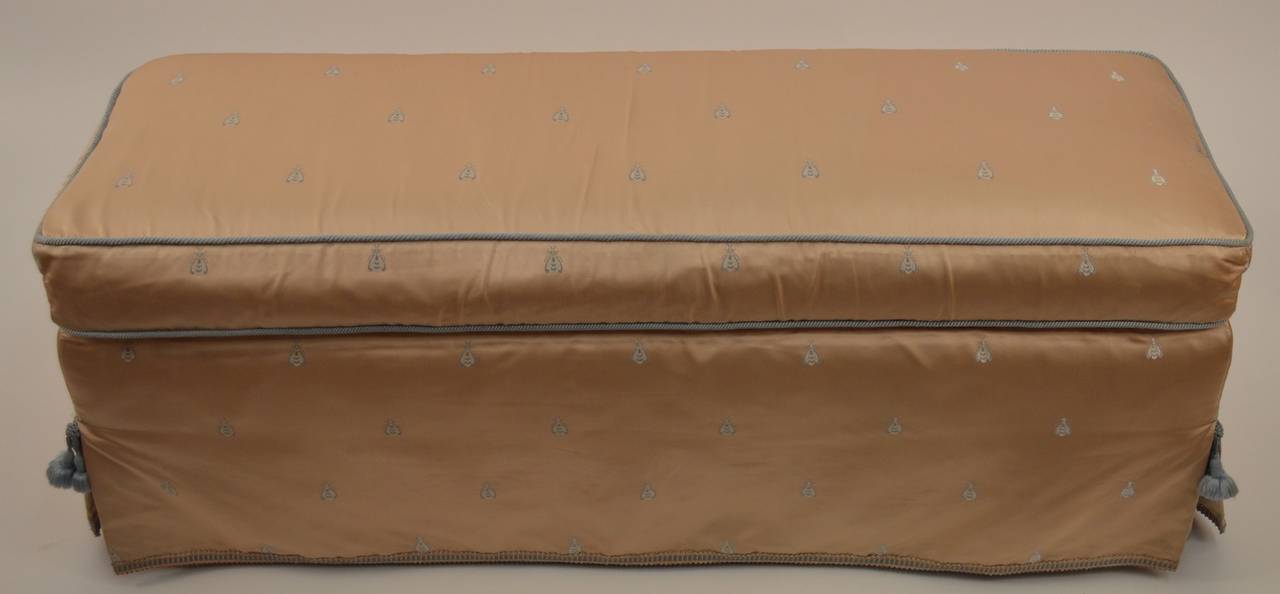 Champagne color fabric with light blue bees, and tassels. Charming and sweet bench perfect decorative   detail item.