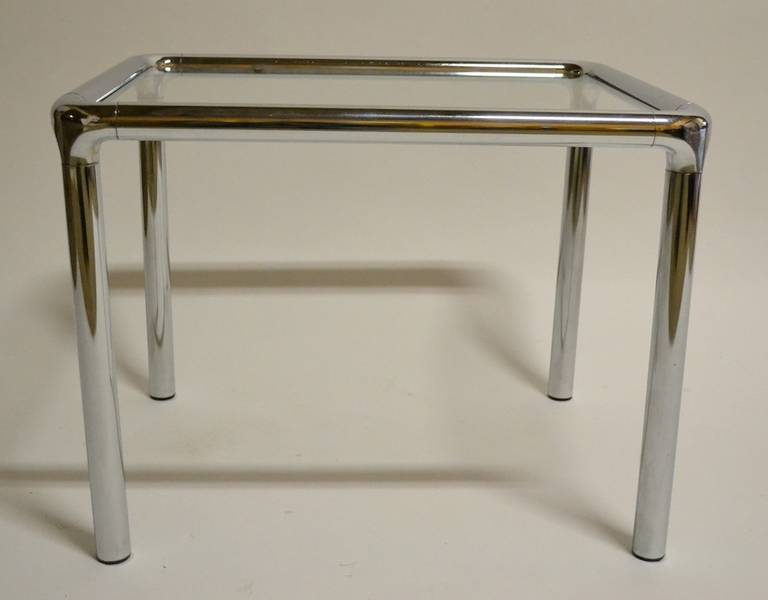 Nice pair of tubular chrome and plate glass tables. Good quality and condition.