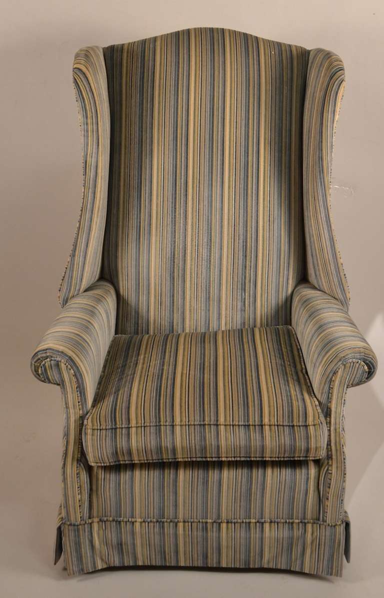 Fun stripped upholstery, high back wing.lounge chairs. Clean and ready to use.