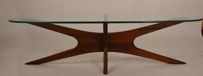 Classic Surfboard top free form base Glass Top Table. The wood base does show some wear, and the top has minor scratching normal and consistent with age.