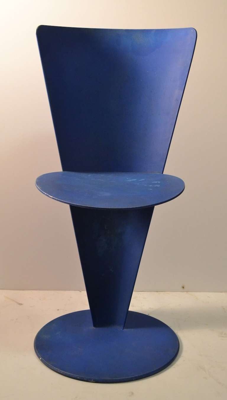 Two painted blue, two black, cast aluminum modernist side chairs of cast aluminum. I believe they are French in origine, however I cannot document them. 
Can be use in an   indoor or outdoor setting.