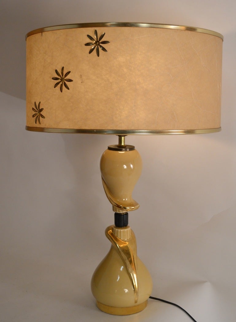Unusual ceramic 1950's ceramic lamps, with the signature three way cylindrical on/off switch found on 