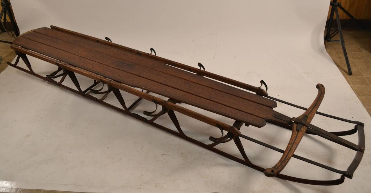 Extra long version of the classic American Flexible Flyer sled. This four seater was manufactured by the S.L. Allen Co. of Philadelphia, Ca 1930's. Perfect as decorative element, sculptural, Vintage Americana. Rustic, Folk Art School item.