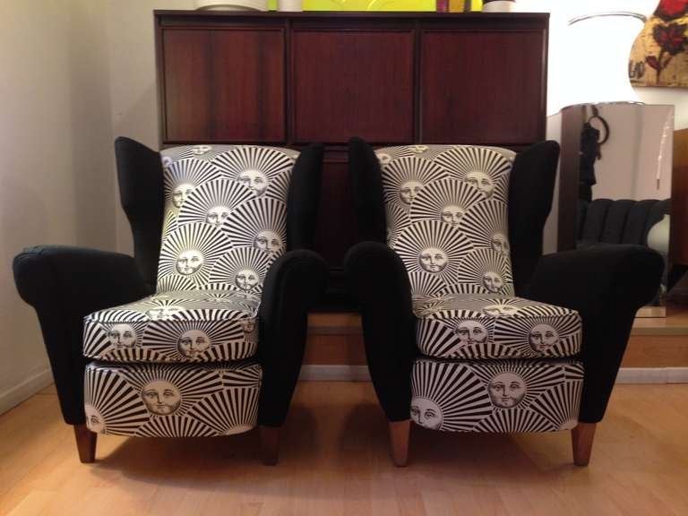 Chic and rare pair of Italian lounge chairs covered with Pietro Fornasetti 