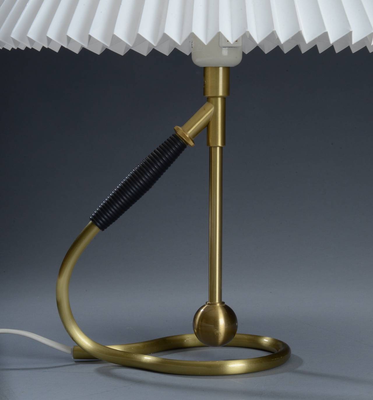 Elegant Table or Wall Lamp by Kaare Klint model 306  in fully original condition with original Le Klint shade.
Circa 1940