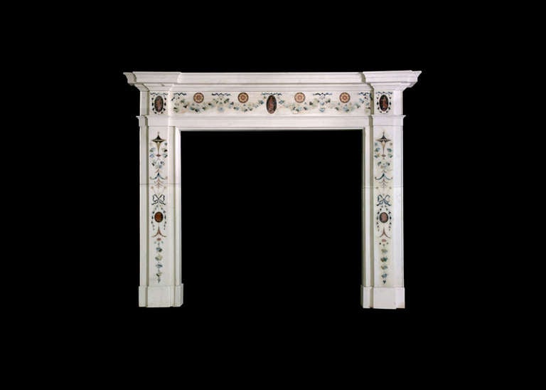 Late 18th century Irish mantel in the manner of Pietro Bossi in statuary marble with inlays of vine leaves, flowers, classical figures and cameos. Opening dimensions: 47.13