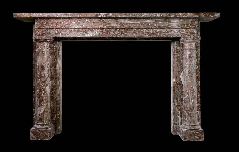 A good late Victorian, circa 1890 mantel in Belgian Rance marble, the simple architectural form is fronted by a detached column with Doric capitals. (REG-L57). Opening dimensions: 46