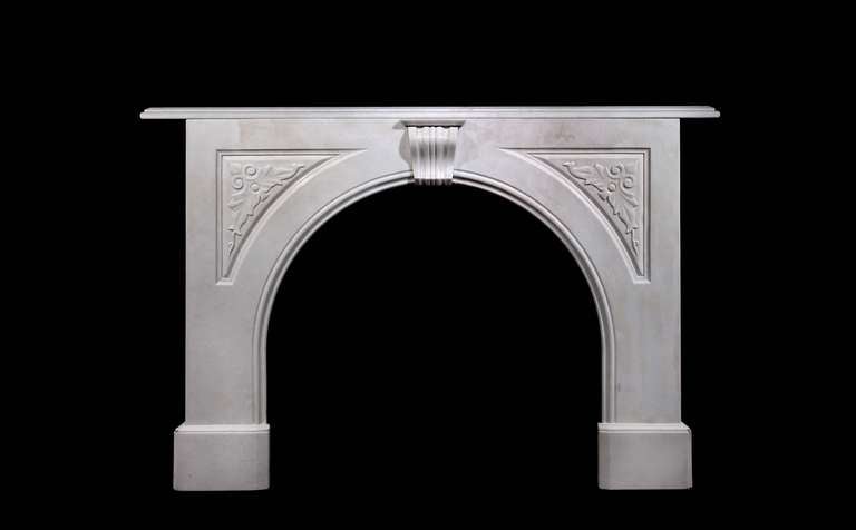 An early Victorian carrara marble carved arched Victorian mantel. Opening dimensions: 39.25