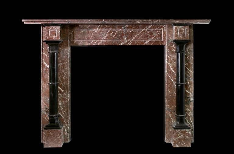 A fine Edwardian columned mantel in Rance marble with Belgium black marble columns. Opening dimensions: 38