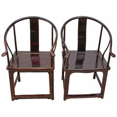 Pair of Antique Black Chinese Qing Horseshoe-Back Armchairs
