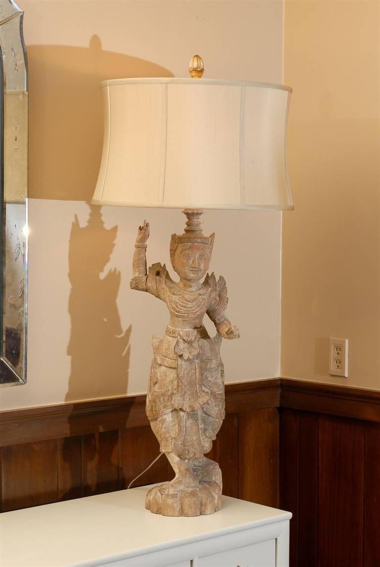 Wood A Spectacular Pair of Monumental Male and Female Asian Lamps