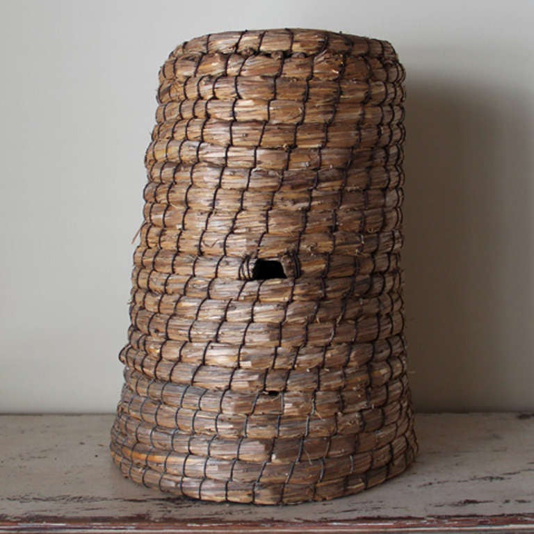 This is a lovely French bee skep. A bee skep is a woven basket used as a bee hive. Bee skeps have been used for about 2000 years. The inside of the skep is open and the bees produce their own honeycomb and attach it to the interior walls.

The