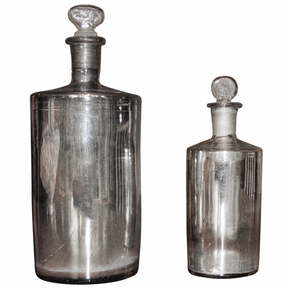 Pair of 19th Century French Mercury Glass Bottles