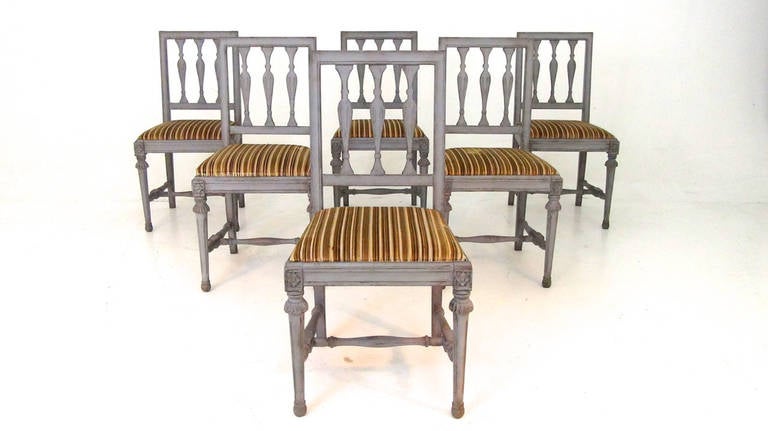 A handsome set of six Swedish dining chairs.