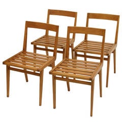 Set of four chairs by Joaquim Tenreiro