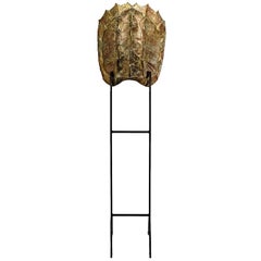 Guscio di tartaruga decorativo su supporto in ferro battuto