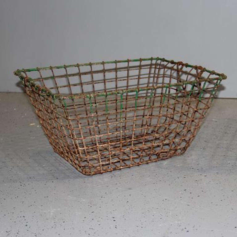 Maison & Co. loves the industrial look of this French oyster basket from the early 20th century. Found in the lovely hilltop village of Goult in the Luberon region of Provence.  

This vintage basket could serve a multitude of purposes.