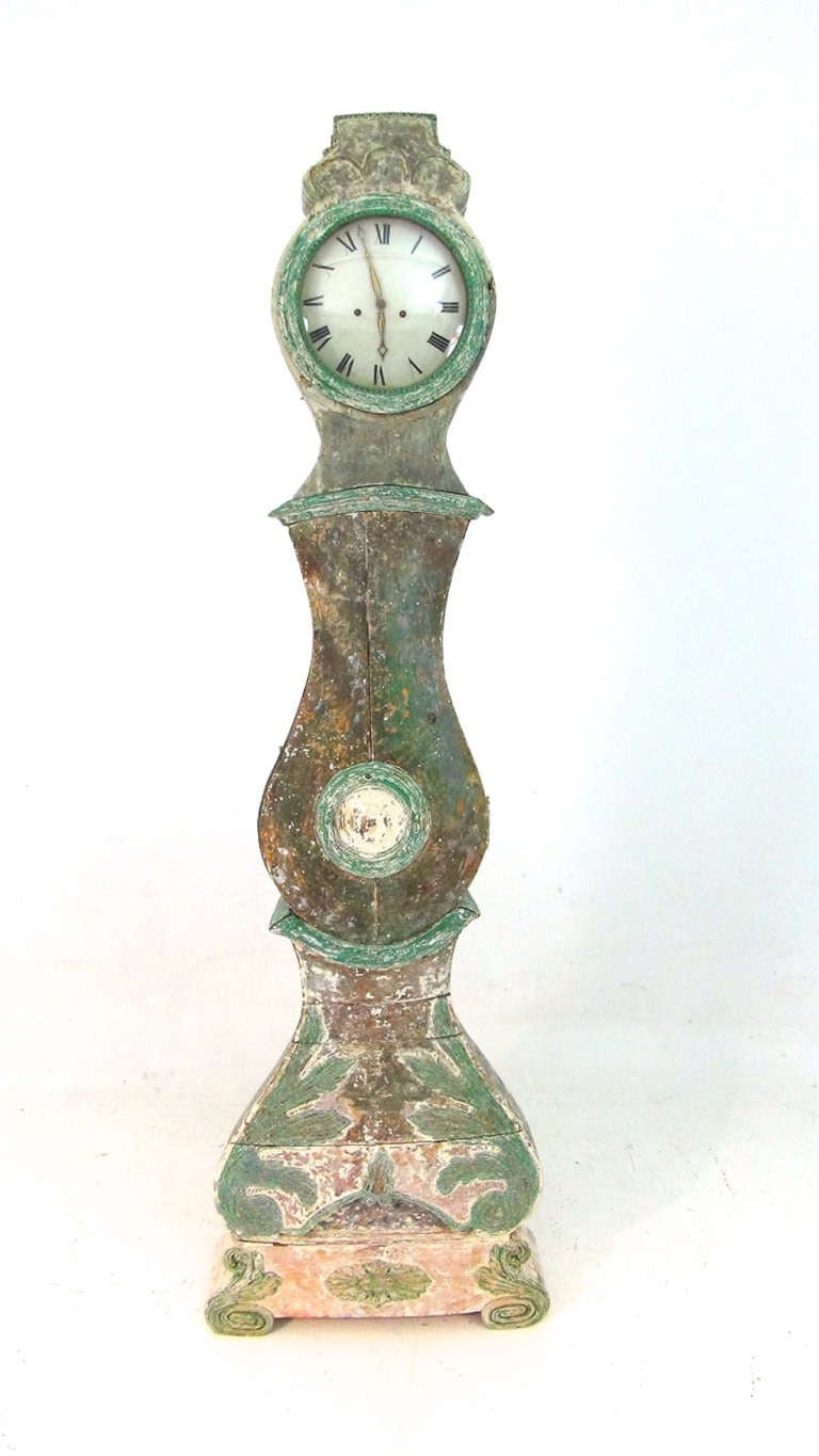 This is a very rare, richly carved Swedish Rococo period grandfather clock that has been hand-scraped to the original green paint.  This clock is from Morin, Sweden.  Morin clocks are not as common as Mora clocks (clocks from Mora, Sweden) and