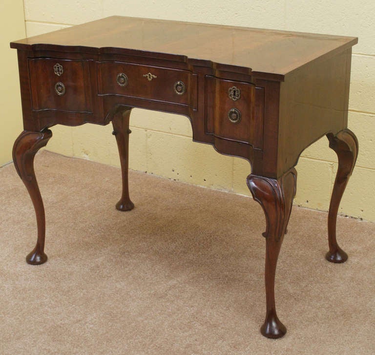 Brass Queen Anne Style Flame Mahogany Lowboy