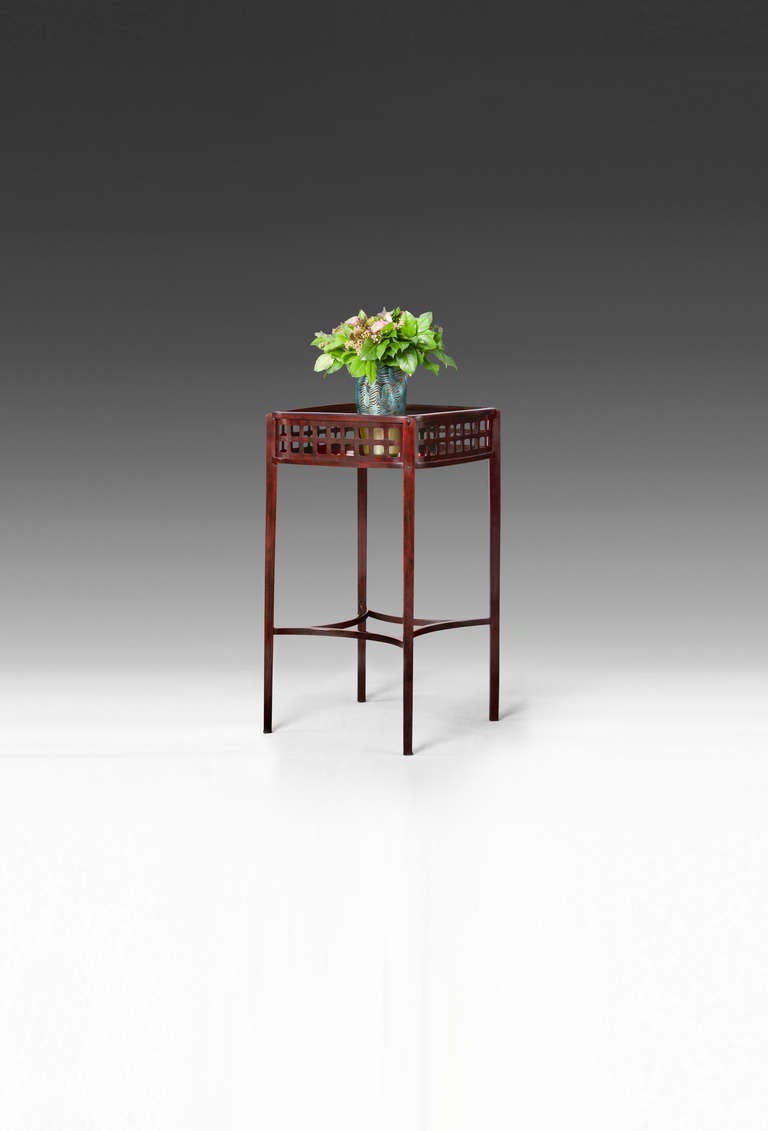 JOSEF HOFFMANN attr.
Brtnice 1870 – 1956 Vienna
J. & J. KOHN

FLOWER ETAGERE

Designed by: Josef Hoffmann attr., Vienna, around 1908.
Executed by: J. & J. Kohn, model no. 1017.

Bent beech and plywood, dyed to rosewood and polished.
H 84.5