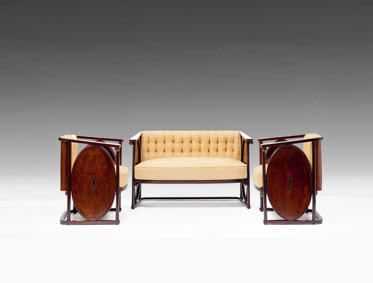 KOLOMAN MOSER
1868 – Vienna – 1918
J. & J. KOHN

SUITE
consisting of: 1 settee, 4 armchairs

Designed by: Koloman Moser, 1907
Executed by: J. & J. Kohn, from 1908 on, model no. 422 C & F,
marked: branded 