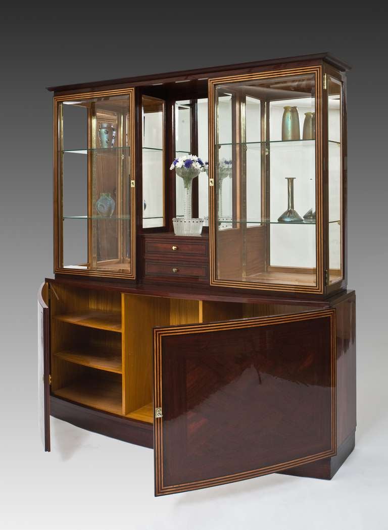 LEOPOLD BAUER

CABINET

designed by: Leopold Bauer, Vienna, 1904

Rosewood and rosewood veneer, geometrical inlay in ebony and boxwood, interior made of satinwood and satinwood veneer, brass fittings, brass drawer division holder, cut and