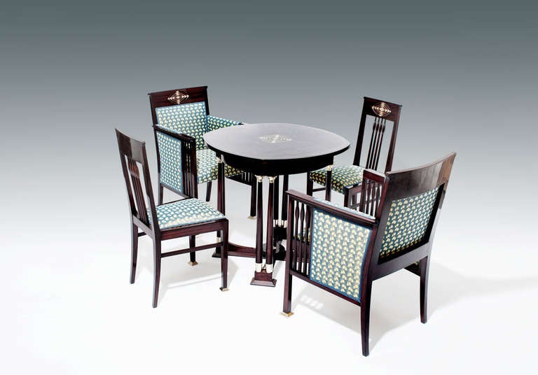 J. & J. HERRMANN 

consisting of: 2 chairs, 2 armchairs, 1 table

designed and executed by: J. & J. Herrmann, Vienna, around 1905

solid mahogany and veneer, solid beech, geometrical inlay in white metal, nickel-plated brass fittings, surface