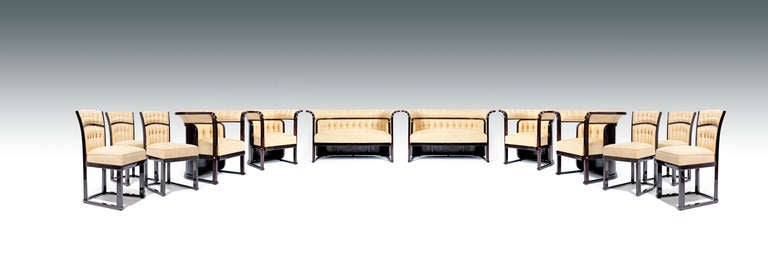 JOSEF HOFFMANN
J. & J. KOHN 

consisting of: 2 settee, 4 armchairs, 6 chairs

designed by: Josef Hoffmann, Vienna, around 1907
executed by: J. & J. Kohn, model no. 675/C, F, S

bent beech and plywood, dyed to rose wood and polished,