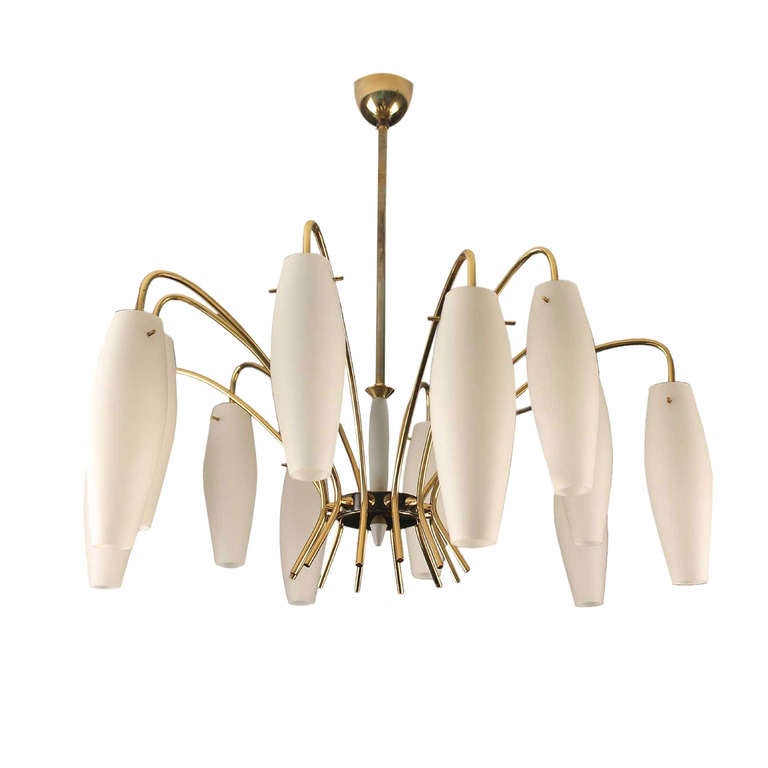 Graceful  chandelier with twelve curved brass spokes, fluted opaline glass shades

 12 candelabra size bulbs up to 40 watts each