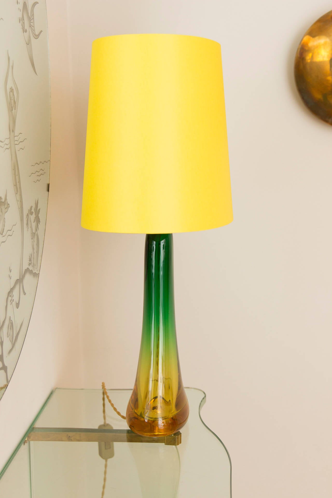 Table lamp by Vetri, Cenedese Murano Italy, circa 1950, blown glass with two different colors green and yellow, new yellow cotton shade, rewired, manufacture label Vetri.
Height 65 cm including shade, diameter shade 38 cm/30 cm.
Base height 45