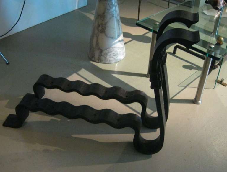 Pair of very big Art Deco Snake hand-forged iron andirons, attr. to Edouard Schenck, France circa 1940. Very big and heavy iron andirons for a big fireplace or maul wood in front of the fireplace.
France circa 1940, original very nice iron