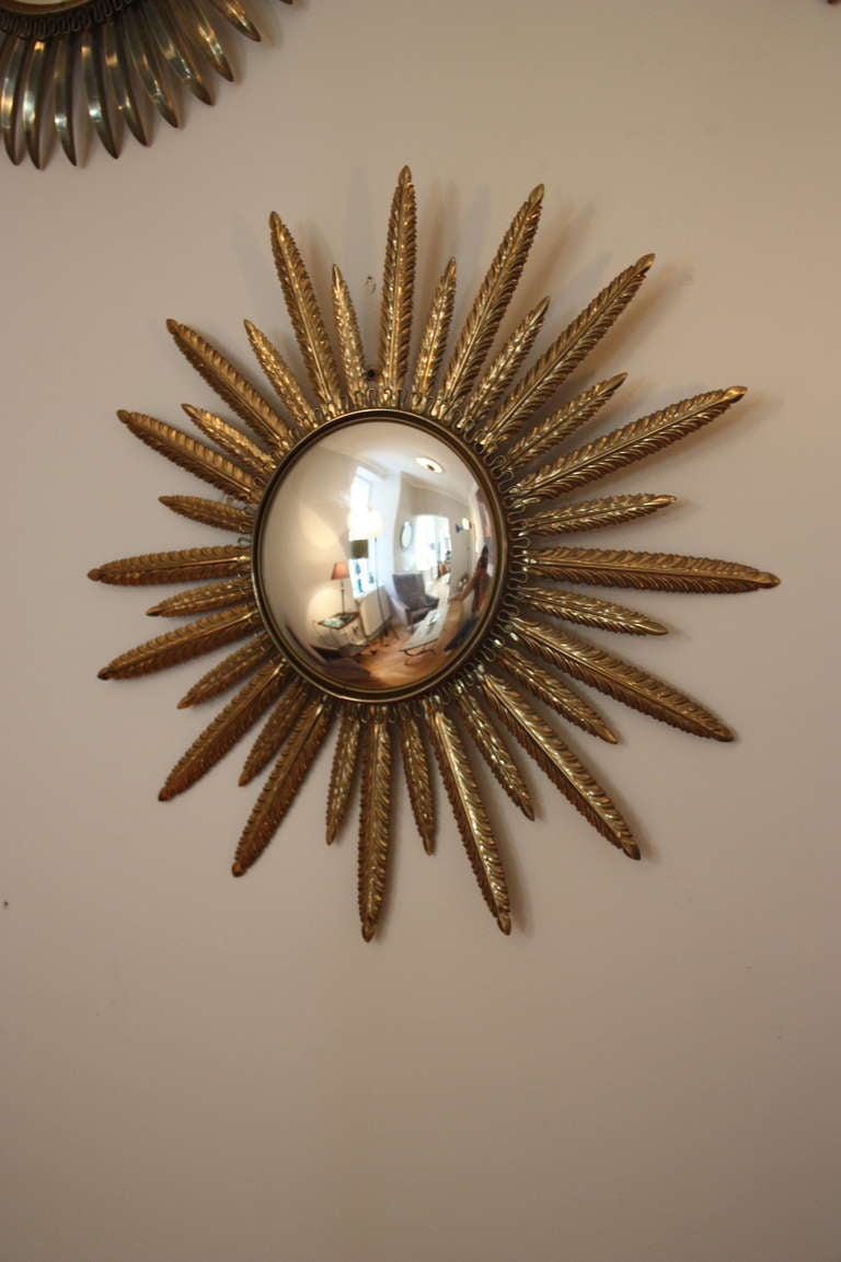 Brass Sunburst Mirror Wall, five brass, convex mirrors, France circa 1950