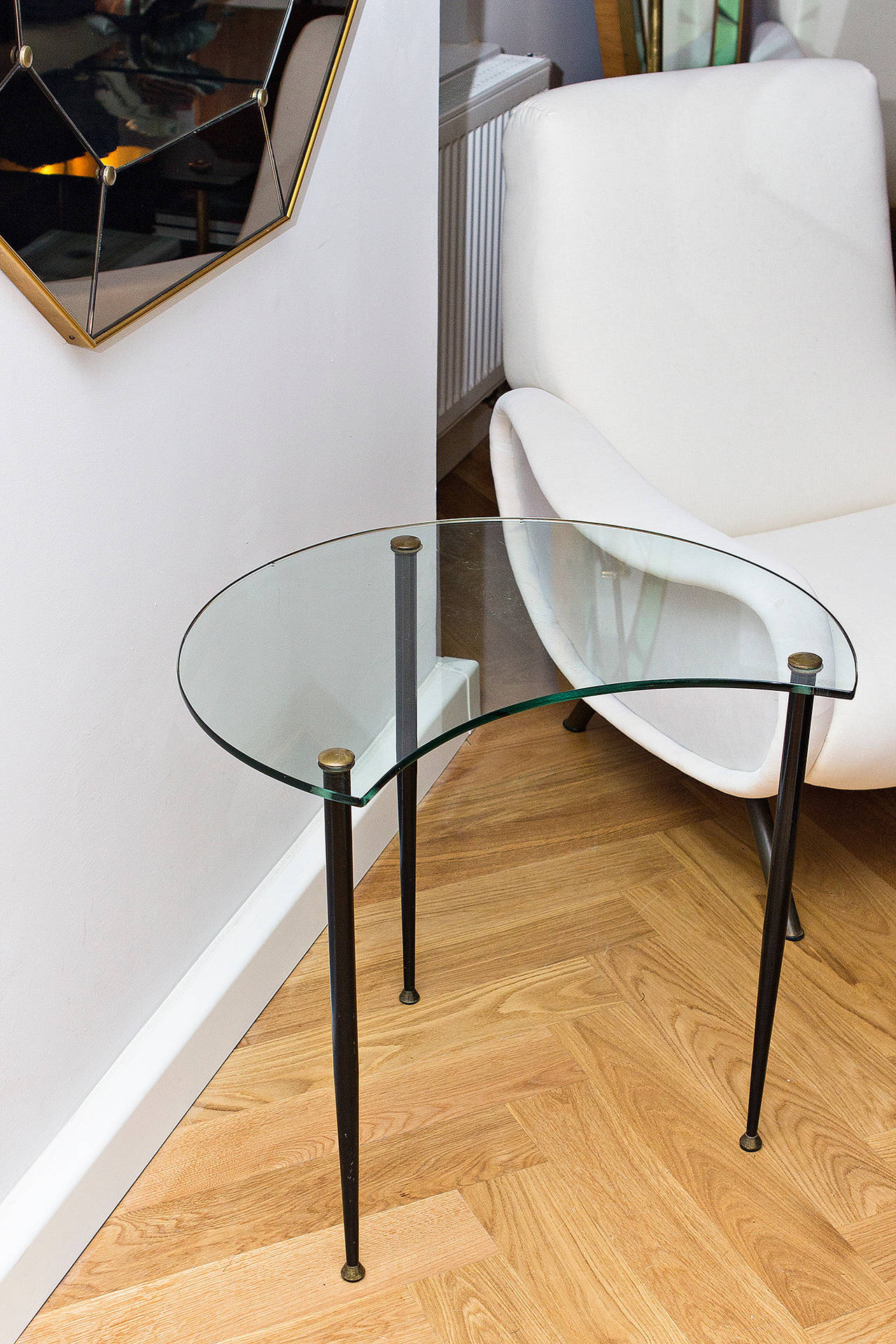 Edoardo Paoli Side table. Lacquered metal and tempered glass, brass. Marked Vitrex. Italy circa 1950's. Height 54 cm diameter 60 cm