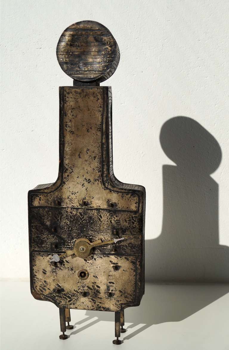 Lorenzo Burchiellaro 'sculptural table clock', 1960's

Execution: Lorenzo Burchiellaro