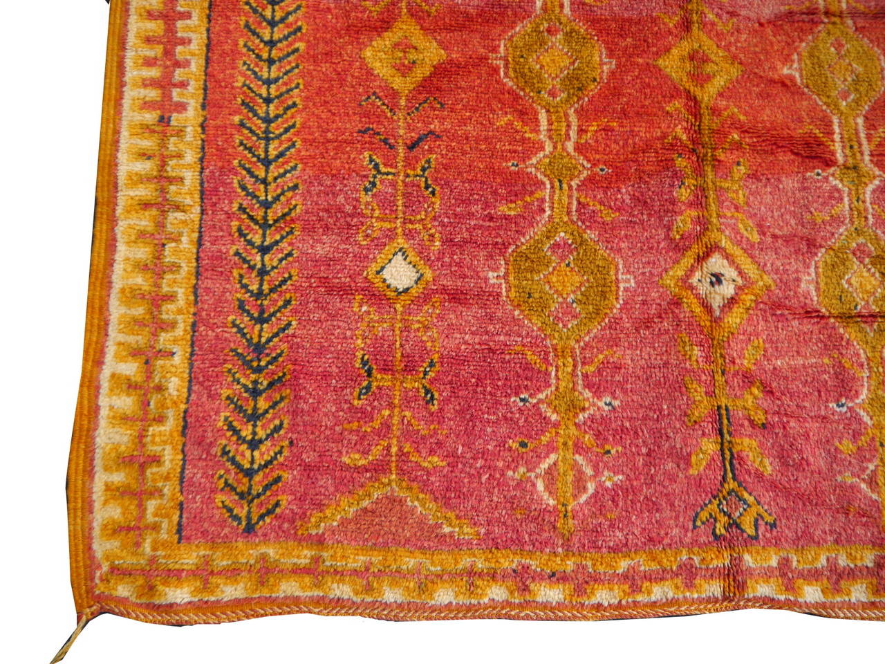 Great vintage Berber carpet, hand-knotted by the Berber women of Morocco. These impressive tribal carpets are all handmade. The wool is handspun and dyed with natural dyes. Typical is the color change called abrash which results from different