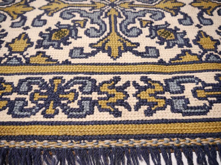 Fine portuguese handstitched needlepoint rug. Decorative moroccan inspired tile design. Made 1940 in the village of Araiollos. It is a traditional work in very good original condition.