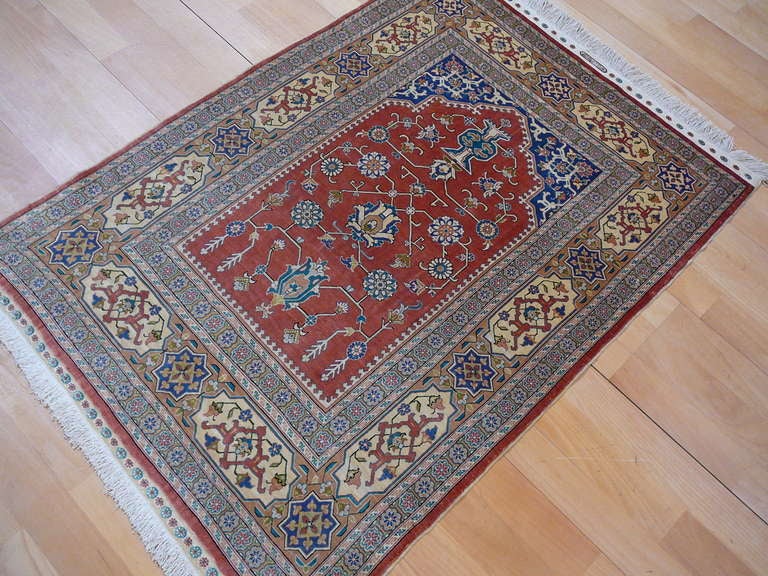 Very fine turkish pure silk Hereke prayer rug from the famous Ozipek workshop. Unusual geometric design gives this masterpiece a rarely seen look.