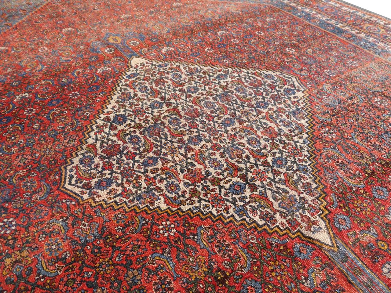 Beautiful antique Persian Bidjar with great colors. Low pile condition.