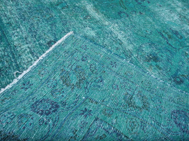 Mid-20th Century Turkish distressed vintage emerald green overdyed rug