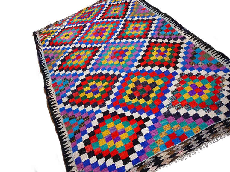 Vintage turkish Kilim, handwoven using cotton. Very unusual and powerful Colors.