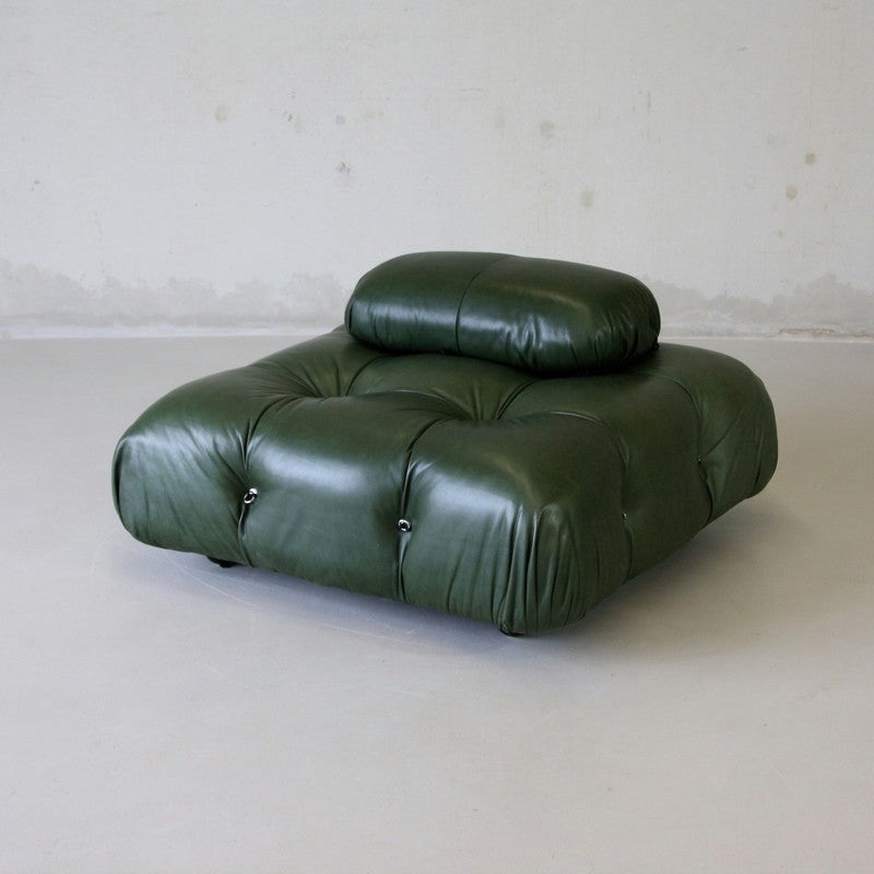 Modular sofa designed by Mario Bellini in 1971 for C&B Italia.

Very early pair of the Camaleonda sofa pieces, covered in wonderful and rare green leather, each with small back pads. These were produced before 1973, when C&B changed their name to
